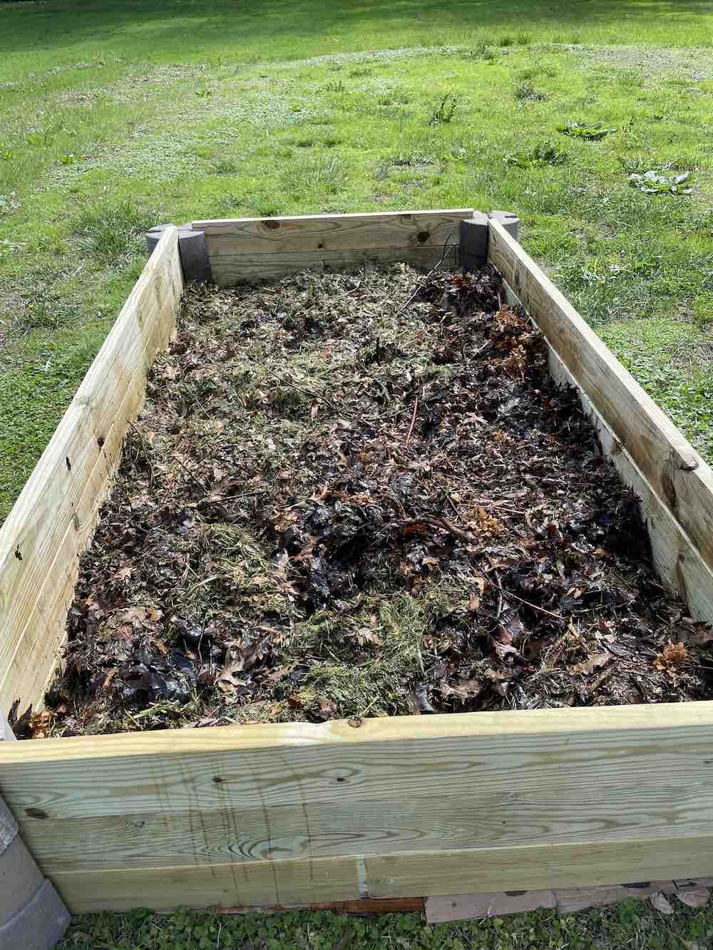 What Should You Put at the Bottom of Your Raised Bed? (& What NOT to Use)